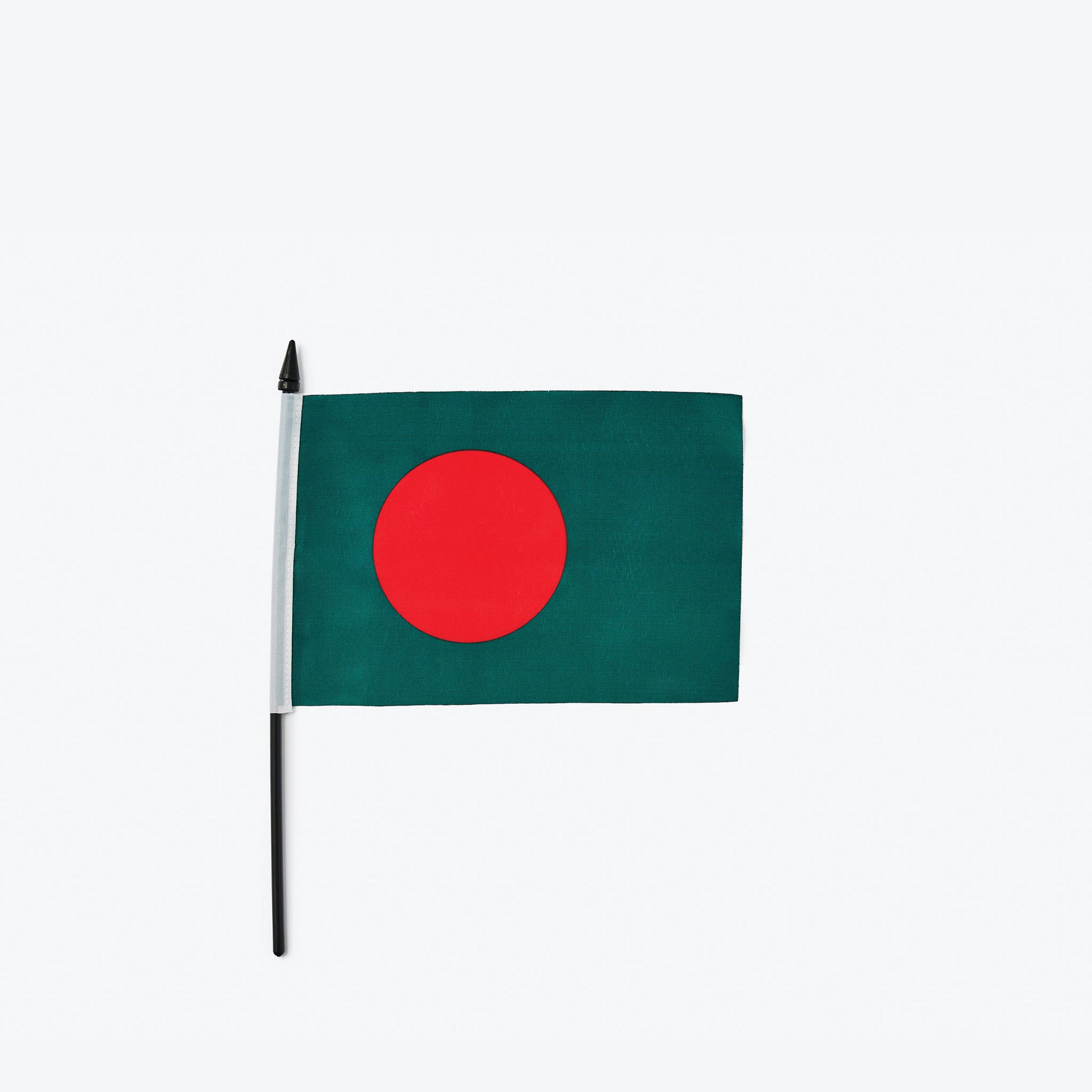 Bangladeshi flag: A green field with a red circle in the center.